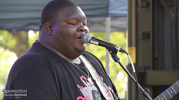Christone Kingfish Ingram performing on tour